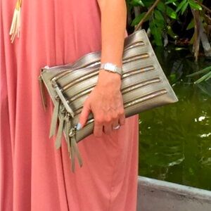 Gold faux leather clutch.